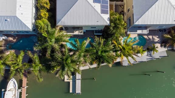 Luxury waterfront home with a heated pool and spa!